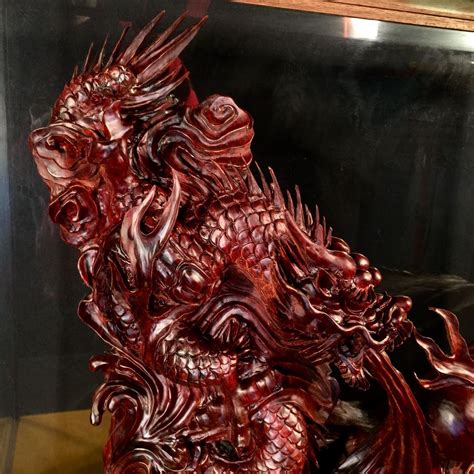 HAND CARVED CHINESE WOODEN DRAGON SCULPTURE WITH DISPLAY CASE, 28'' L X 21'' H