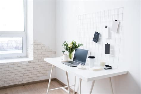 Premium Photo | Stylish white professional office interior minimalist loft workspace