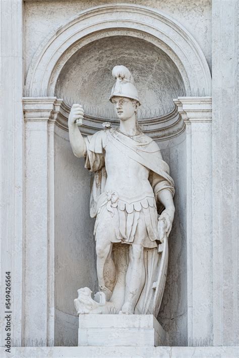 Old sculpture of a Roman soldier in armor, in downtown of Venice, Italy, closeup, details. Stock ...