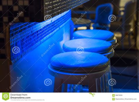 Empty Stools Along Bar Illuminated in Blue Light Stock Photo - Image of leisure, vivid: 98670028