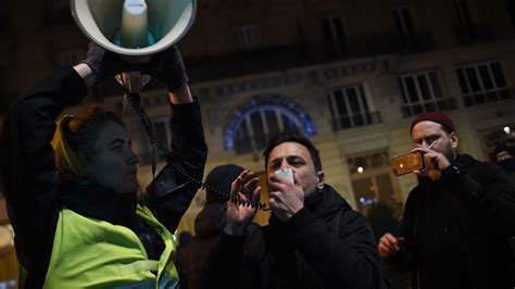 Police backup called to guard President Macron as protesters try to ...