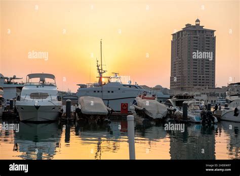 The Pearl Qatar Marina, expensive yachts in Doha bay, Qatar Stock Photo ...