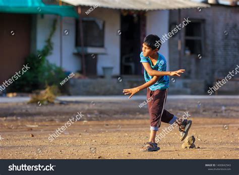 Rural Indian Child Playing Cricket Stock Photo (Edit Now) 1400842943