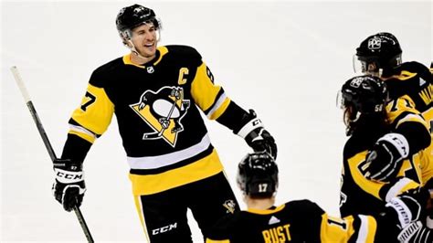 Crosby picks up pair of assists in 1,000th NHL game as Penguins beat ...