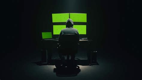 Hacker With Green Screen Monitor - IMAGESEE