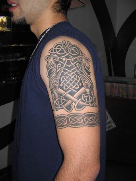 Outstanding Tribal Arm Tattoo Designs For 2011 Tribal Arm Tattoo New Style for College Boys ...