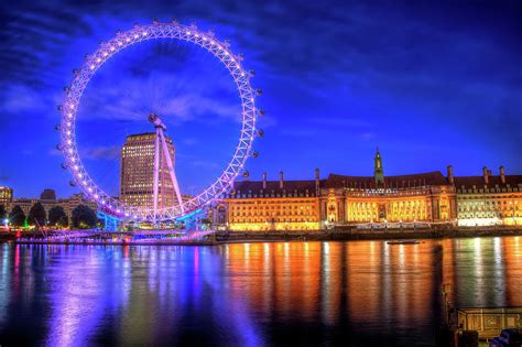 London Eye at night Photograph by Sharon Ann Sanowar