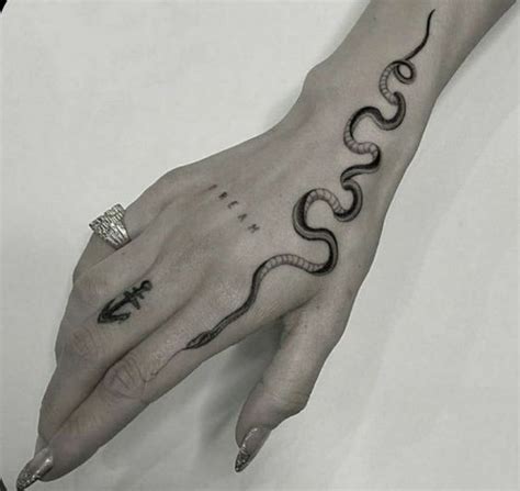 Here are some ideas for small snake tattoo on your wrist