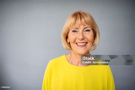 Portrait Of Cheerful Senior Caucasian Woman With Bobbed Hair Stock Photo - Download Image Now ...