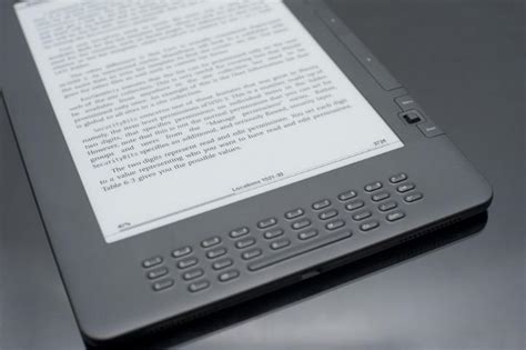 Free Image of E-Reader on Dark Grey Background | Freebie.Photography