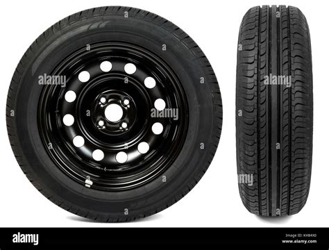 Set of two new black tyres Stock Photo - Alamy