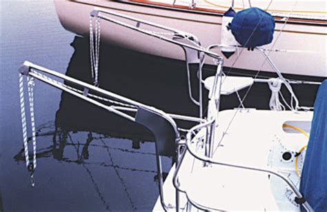 Lift up dinghy davit systems and dinghy davits for inflatable boat davit systems.