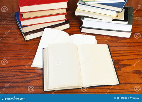 Open books on wooden table stock image. Image of shelf - 36181839