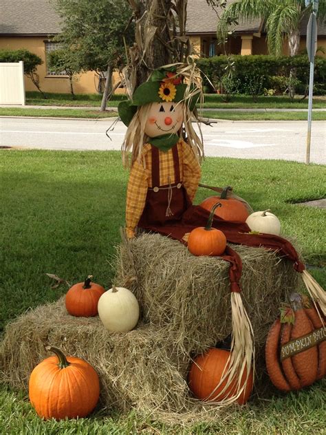 Scarecrow, pumpkin and hay bales. Cute fall display and photo op for ...