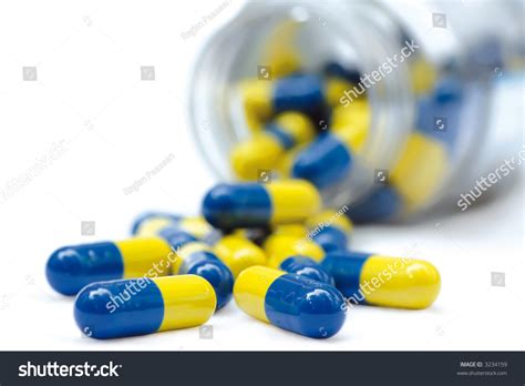 Pot Of Yellow And Blue Capsule Pills Stock Photo 3234159 : Shutterstock