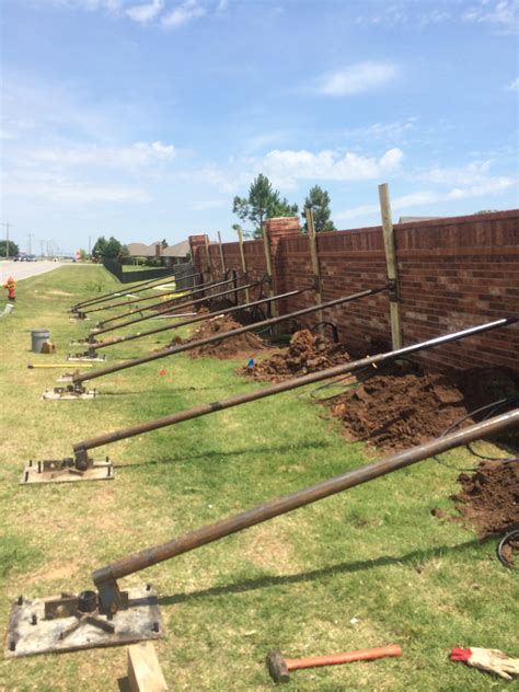 How To Fix Leaning Brick Fence WIth PowerLift Repair