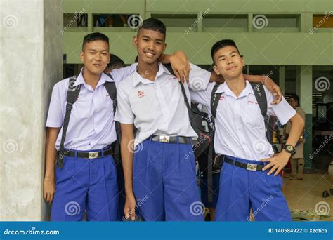 Three Thai Student Boys Embracing Together In Their Dirty School ...