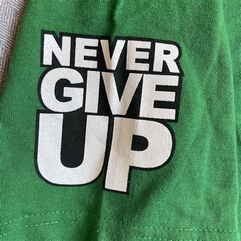 Never Give Up Cenation Logo