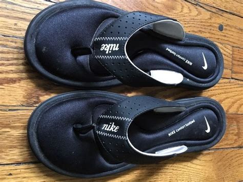 Women’s Nike flip flops. They have the memory foam sole in them. Super ...