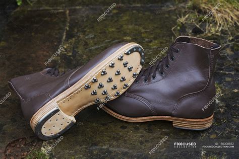 Brown leather work boots — footwear manufacturer, strength - Stock ...