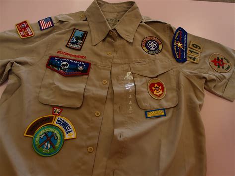 Patches on this scouts uniform.