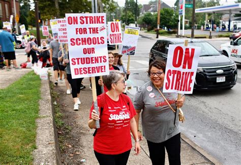 As students go back to school, staff strike for better pay and ...