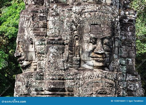 Faces of Bayon temple stock image. Image of building - 133016641