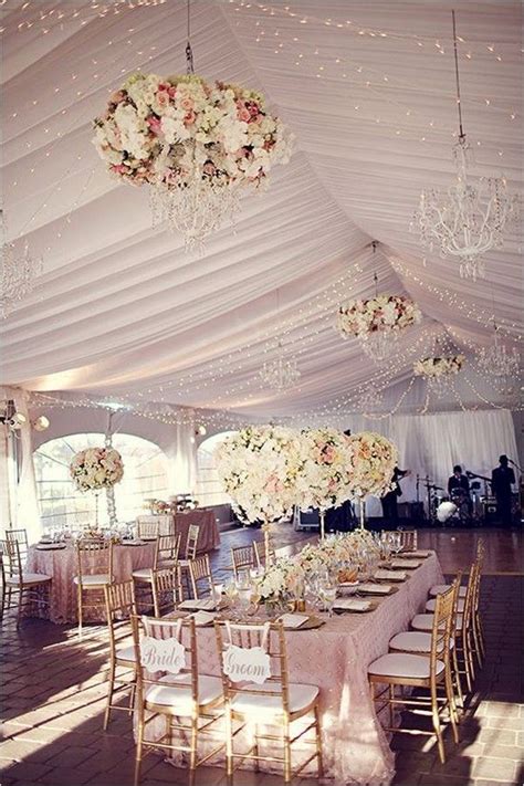 Floral chandeliers - so pretty! | Wedding tent decorations, Tent ...