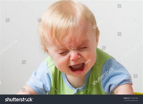 Young Toddler Crying Away. Has His Eyes Closed And A Huge Open Mouth From Being So Sad Stock ...