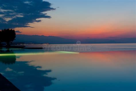 Infinity Pool on the Beach at Sunset Stock Image - Image of coast, greece: 22494059