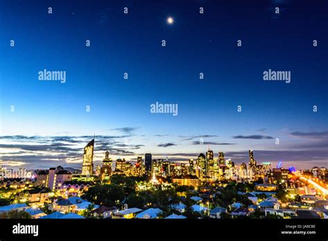 Brisbane City skyline at sunset Stock Photo - Alamy