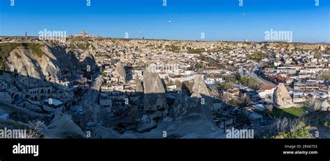 A panorama picture of the town of Goreme, in Cappadocia, at sunrise ...