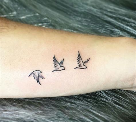 Pin by Carina T on Tatts | Bird tattoo wrist, Tiny bird tattoos, Swallow bird tattoos