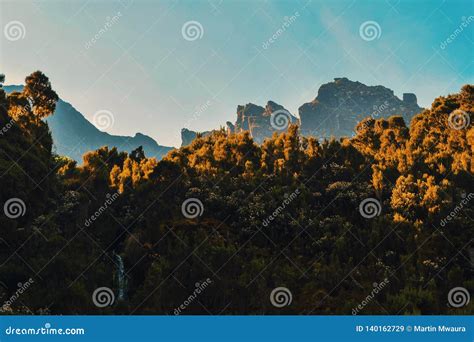 Sunrise in the Mountains stock image. Image of silhouette - 140162729