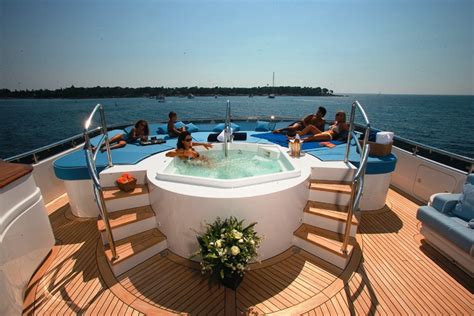 Luxury yacht ELENI - Jacuzzi and sunpads on the sundeck — Yacht Charter ...