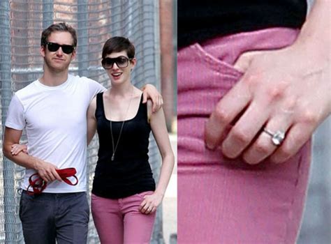 Anne Hathaway & Adam Shulman Adam Shulman presented the actress with a ...