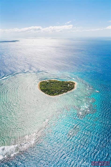 - Aerial view of Tavarua, heart shaped island, Mamanucas, Fiji ...