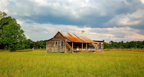 Brown House in the Middle of Green Open Field Surrounded With Trees during Daytime · Free Stock ...