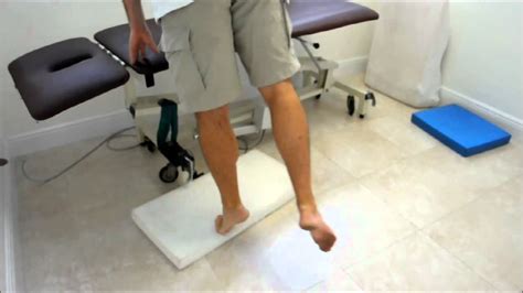 Tibialis posterior strengthening: eccentric & ballistic heel raise over step - YouTube