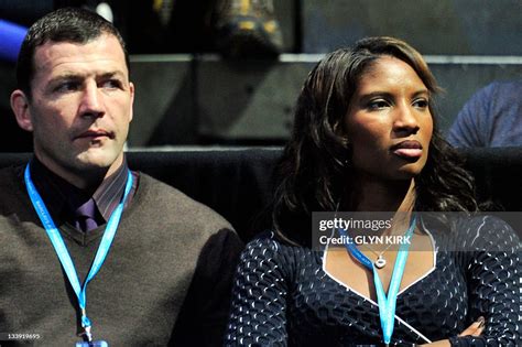 British athlete Denise Lewis and husband Steve Finan watch Mardy Fish... News Photo - Getty Images