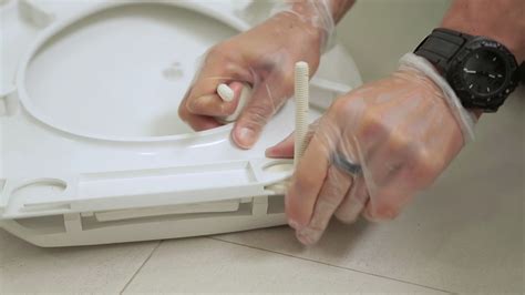 Install A Toilet Seat - YouTube