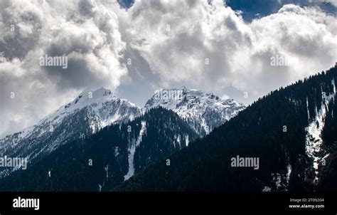 Kashmir Snow mountains. Nestled within the picturesque Kashmir valley, breathtaking sight, with ...