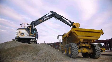 Electric excavator unveiled by Deere at CES - Rock to RoadRock to Road