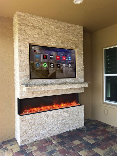 Rock Wall, TV and Fireplace Combo | Synergy Outdoor Living FL