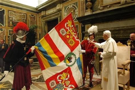 Pope Benedict is presented with the Swiss Guard flag | Swiss guard ...