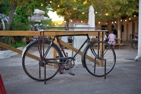 Premium Photo | Garden decor, old red and vintage bicycle.