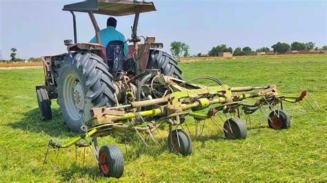 Watch this amazing machine used in the Hay making process - YouTube