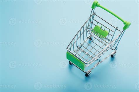 Supermarket shopping cart isolated on blue background. 13725676 Stock Photo at Vecteezy