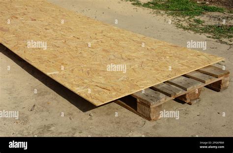 Oriented strand board for house roof sheathing cut Stock Photo - Alamy