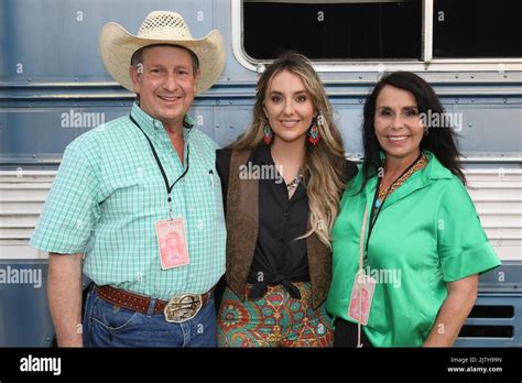 Lainey Wilson with her parents Brian Wilson and Michelle Wilson Stock ...